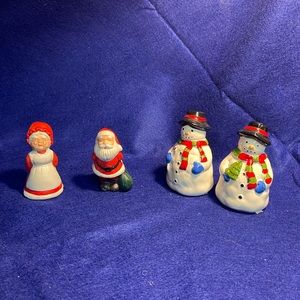 Two sets of holiday salt and pepper shakers